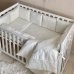 Комплект постельного белья для новорождённого DreamLand валик молочный